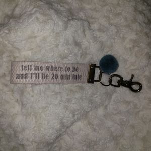 Late Altar'd State key chain strap and fuzz ball